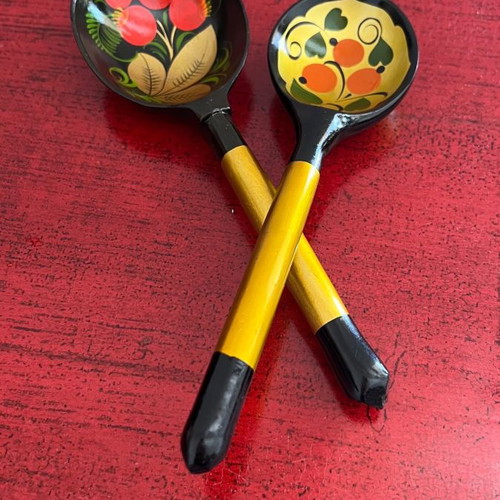 Decorative spoons used, set of 4 wooden with folk motifs