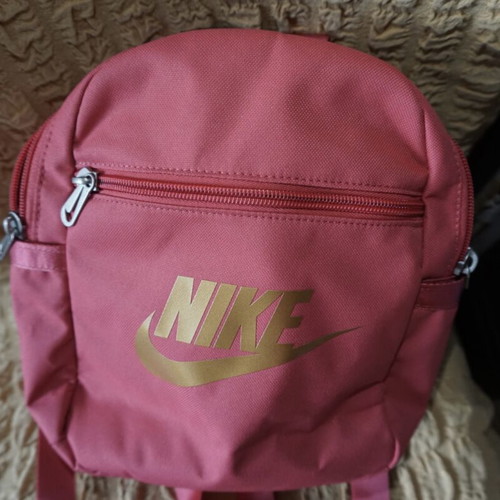 Nike mini backpack like new with gold logo, red