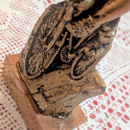Vintage decorative cyclist figurine on marble base