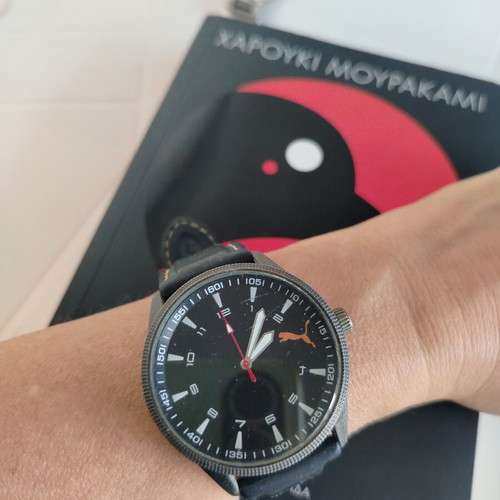 Sport unisex wristwatch 40mm black dial used