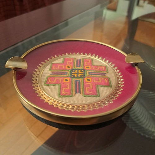 Vintage ashtray used with ornate design