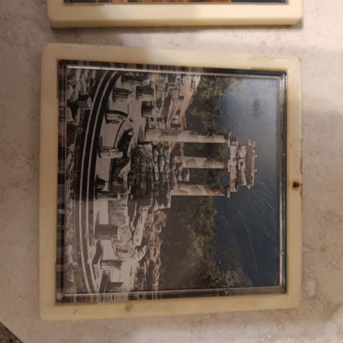 Very small art prints used, coaster size
