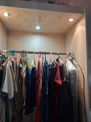 Wardrobe cabinet used with wheels and built-in spotlights