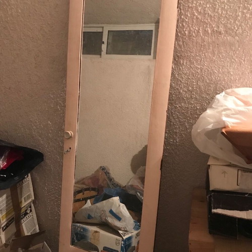 Mirror on old wardrobe door late 19th century