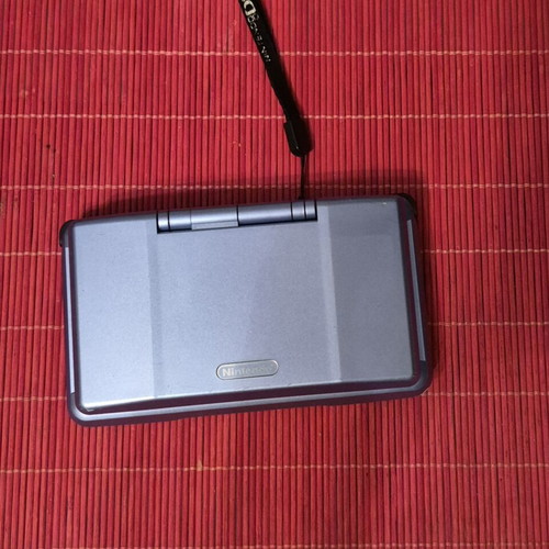 Nintendo DS (fat) console used with 7 games, carrying case and charger