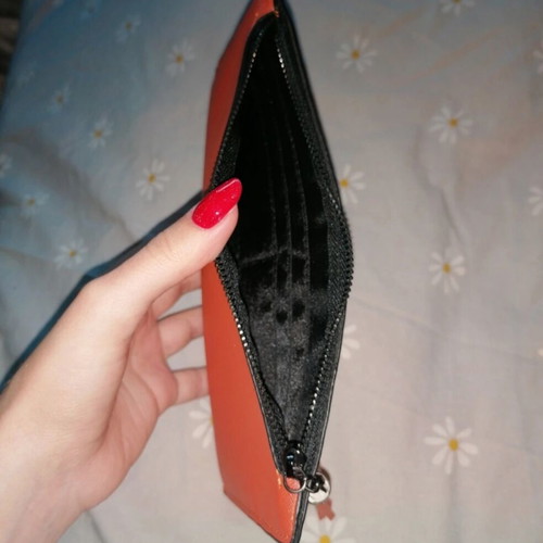 Orange wallet with six card slots and two bill compartments