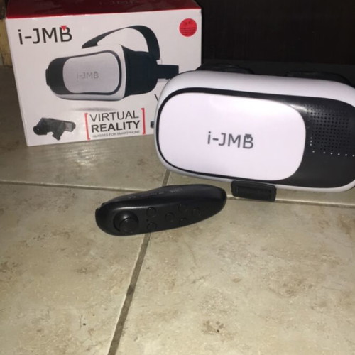 VR headset for mobile with Bluetooth controller used