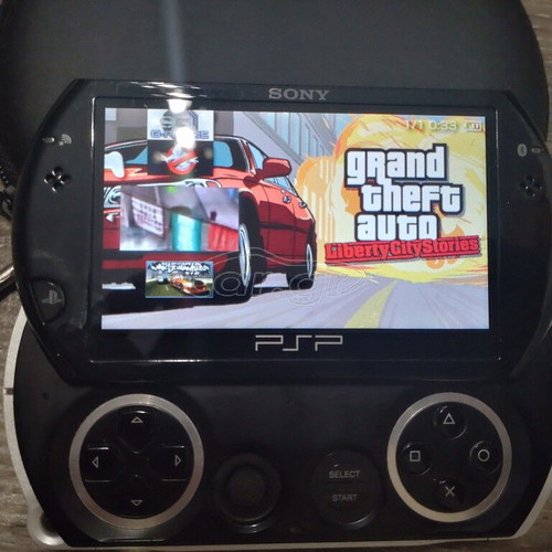 Psp Go 16 GB like new with 6 games and case