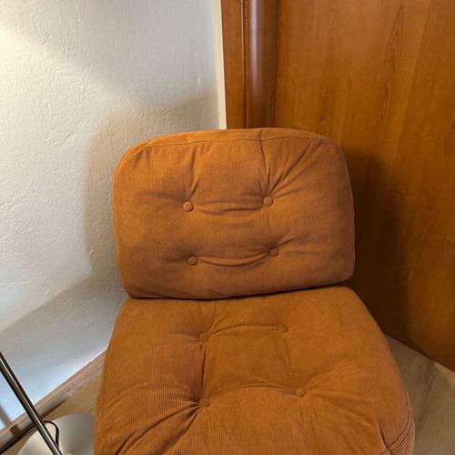 Modern swivel armchair, terracotta fabric and metal