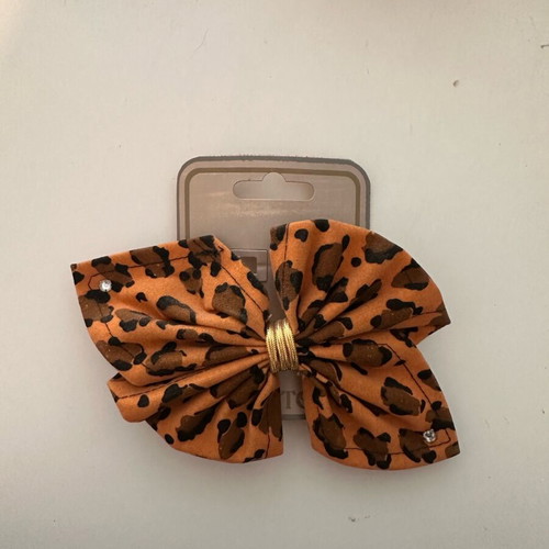 Leopard hair bow like new with rhinestones