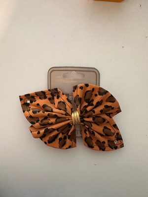 Leopard hair bow like new with rhinestones