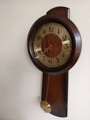 Battery Pendulum Wall Clock like new