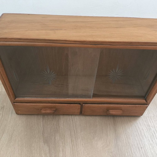 Vintage cabinet restored with engraved glass