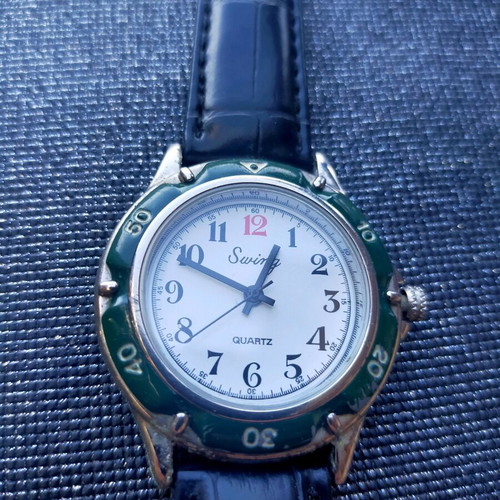 Watch used, unisex, green