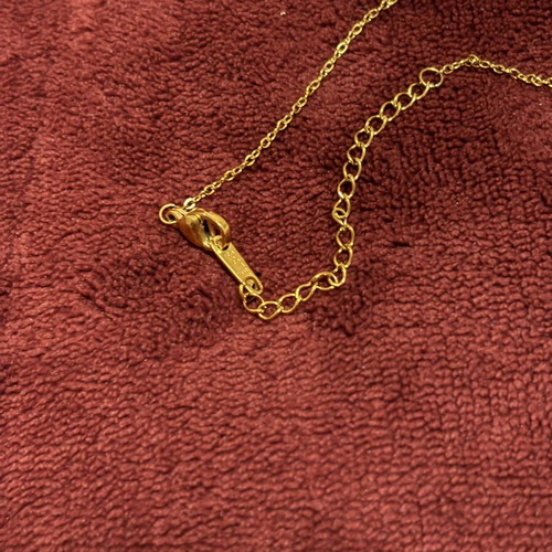 Gold necklace with crystal heart pendant