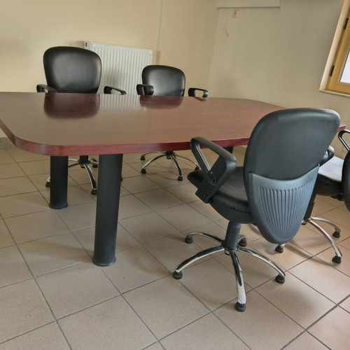 Conference table cherry wood with 6 leather swivel chairs like new