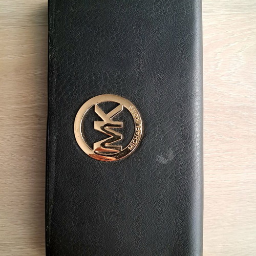 Michael Kors wallet used, black with gold monogram