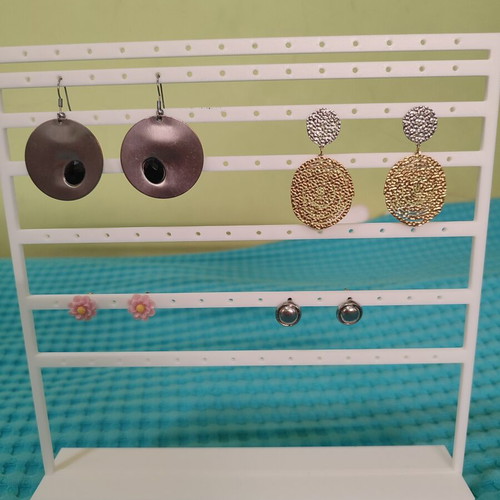 Earring stand new, available in various colors