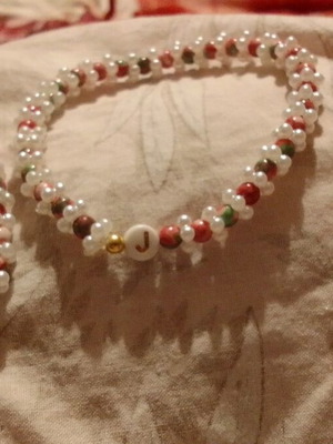 Handmade jewelry set with elastic bracelet, earrings, and leather bracelet