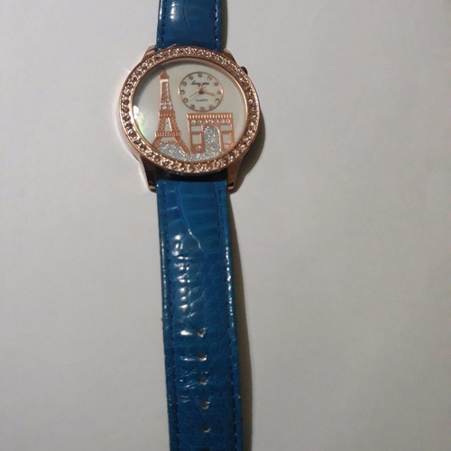 Women's wristwatch with rhinestones and blue straps used