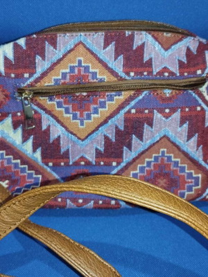 Crossbody bag used multicolor fabric and leatherette