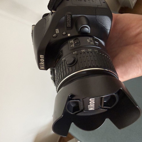 Nikon D5200 DSLR with AF-S DX 18-55mm VR II lens, like new
