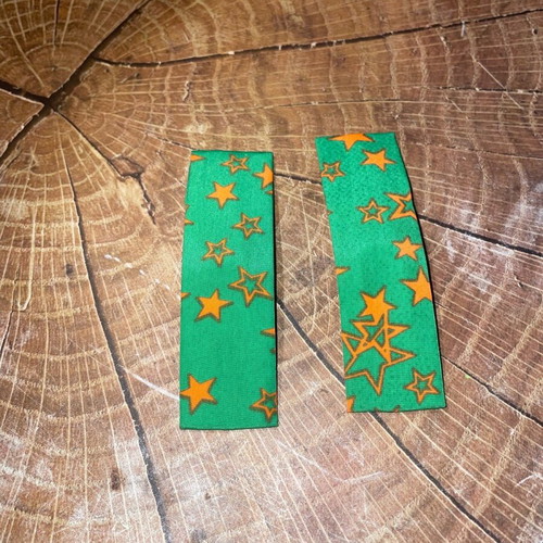 Hair clips green with stars like new, unworn