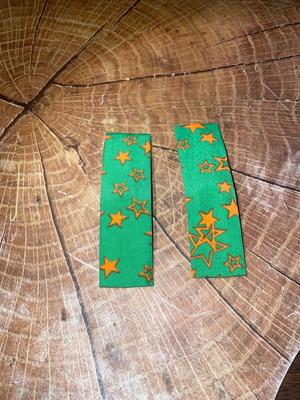 Hair clips green with stars like new, unworn