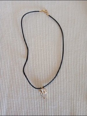 Strass pendant on black cord like new