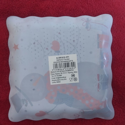 Glass Christmas plate like new with snowman and tree design