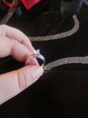 Silver 925 solitaire ring like new with side zirconia