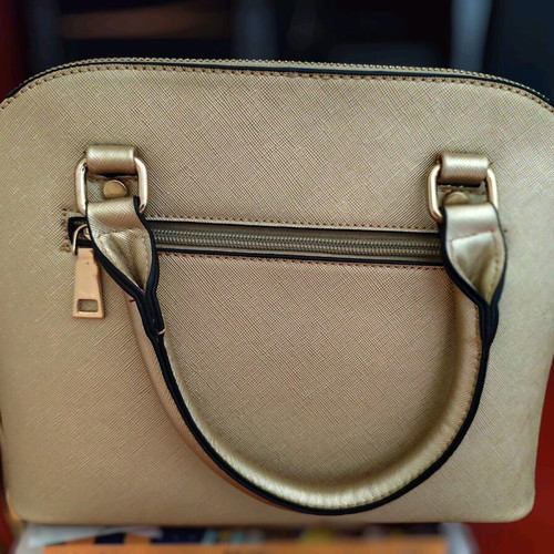 Gold handbag like new with detachable strap