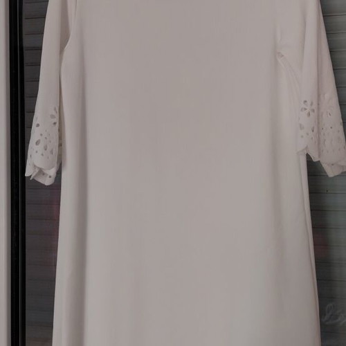 White women's dress with lace design, polyester, 3/4 sleeves, knee length