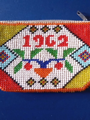 Beaded knitted wallet used, dated 1962