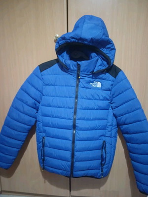 The North Face blue jacket like new, size M unisex
