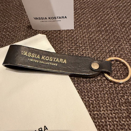 Leather keychain Vassia Kostara Limited Edition like new, black and gold