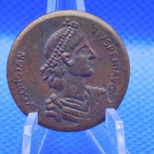 Decorative bronze medal with relief design