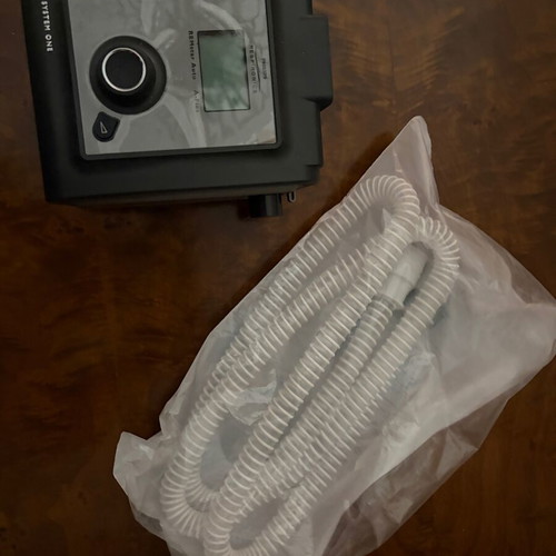 Cpap apnea breathing machine used with hose in sealed packaging