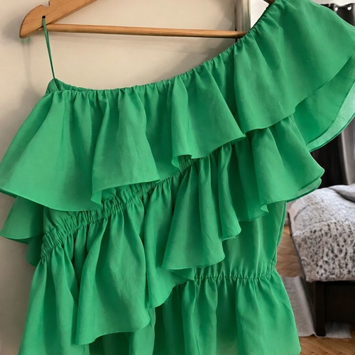 Green blouse with ruffles