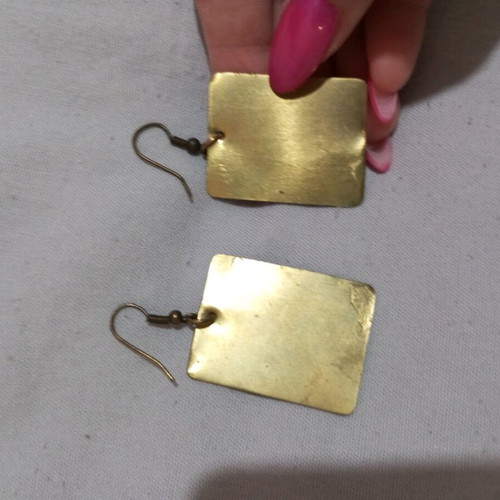 Metal earrings used with figure