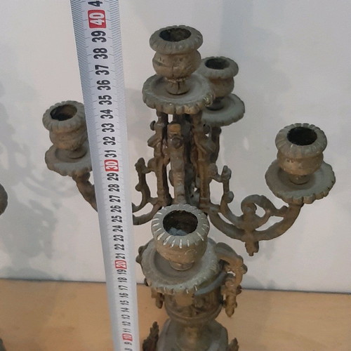 Bronze candlesticks used, pair with patina and carved base