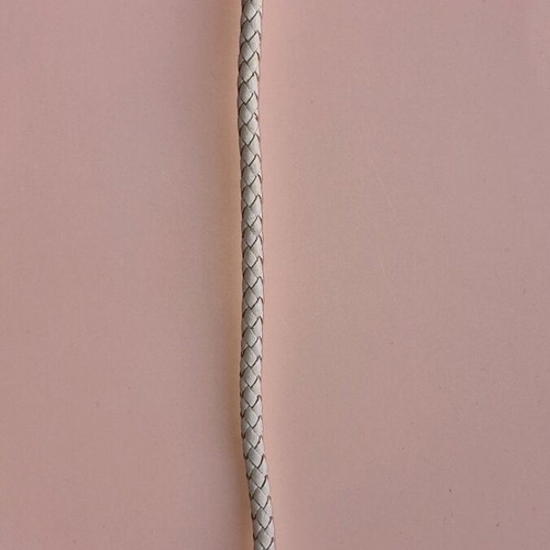 Bracelet made of white leather with gold clasps used