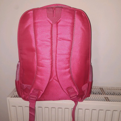 Backpack new with 3 large pockets and 2 small side pockets