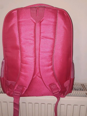 Backpack new with 3 large pockets and 2 small side pockets