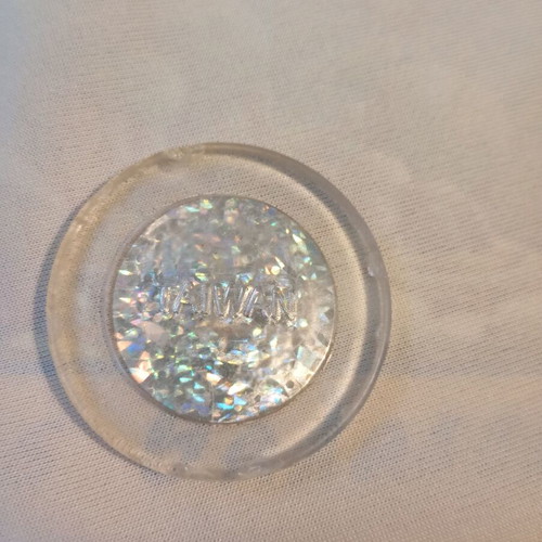 Collectible tazo cap used with holographic skull design