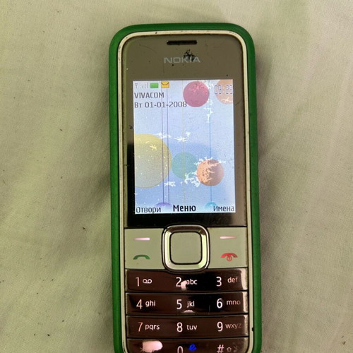 Nokia 7310 Supernova phone like new, green with worn front panel