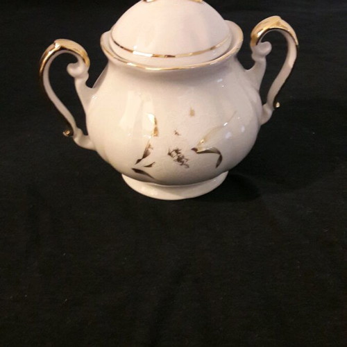 Vintage porcelain teapot and sugar bowl set like new