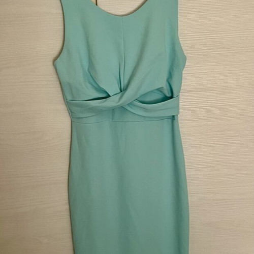 Dress new in turquoise color, size M