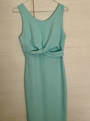 Dress new in turquoise color, size M