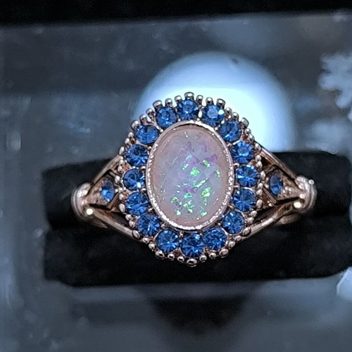 Rose Gold women's ring with white opal and blue crystals, stainless steel